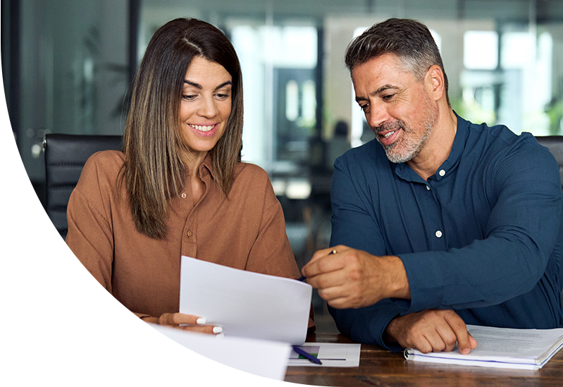 man and woman reviewing document
